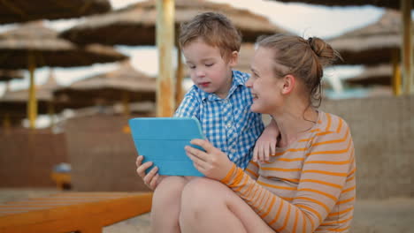 Little-boy-with-is-mother-at-a-beach-resort