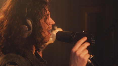 singer in a recording studio