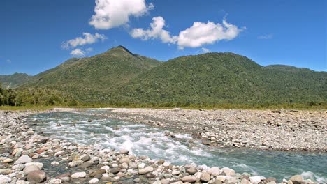 Mountains-clouds-and-the-clear-blue-waters-of-the-Huequi-River-in-Southern-Chile