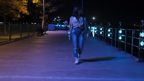 Woman-walking-on-night