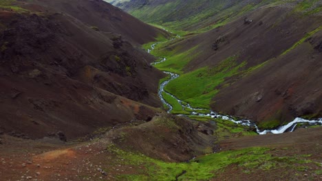 winding river at the valley of reykjadalur at the south coast of iceland