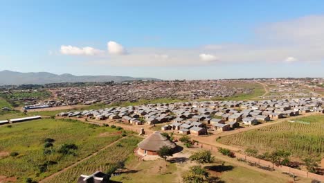 morning in suburban african village, dzaleka refugee camp, aerial view