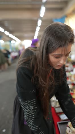 woman browsing at a flea market