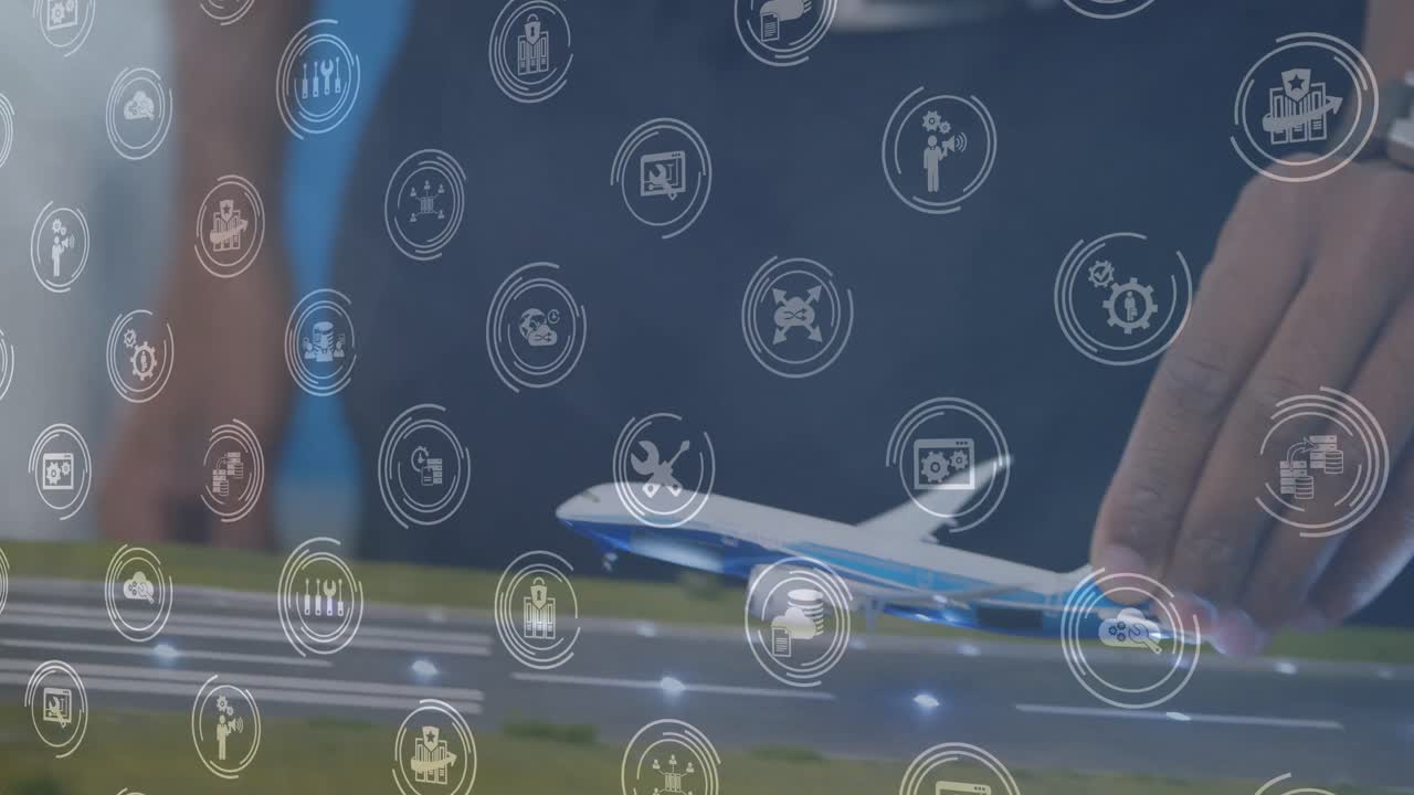 animación de iconos digitales sobre la sección media de una mujer volando un modelo de avión en la oficina.