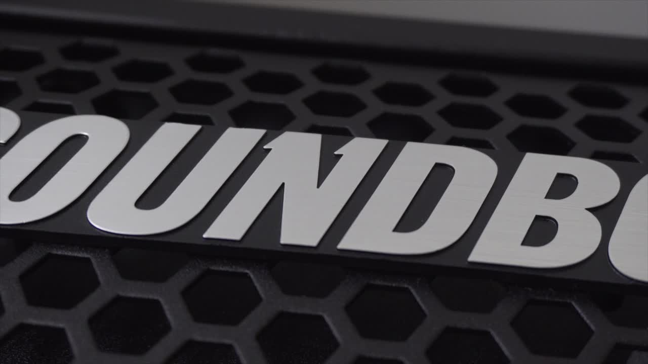 Slow pan from left to right over Soundboks logo, stopping at the "11" N,  in the logo