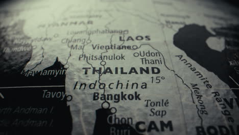 close-up of a vintage world map highlighting thailand