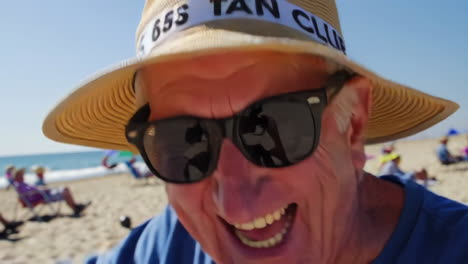 man enjoying a sunny day at the beach