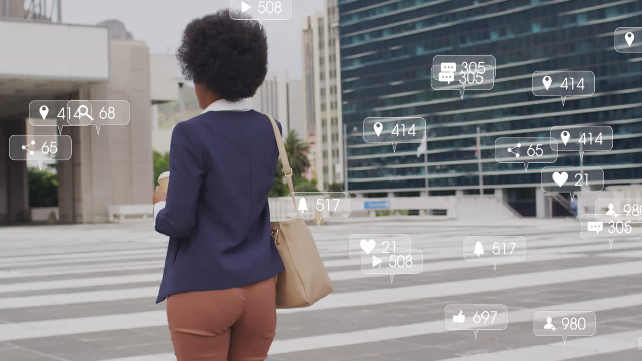 Animation of social media data processing over african american woman using smartphone in city