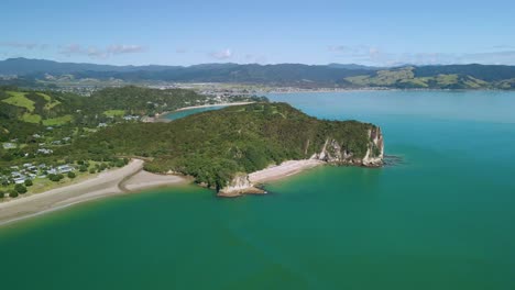 flying over scenic clifftop in new zealand