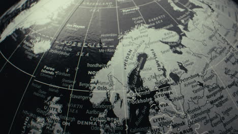 close-up of a black and white world globe