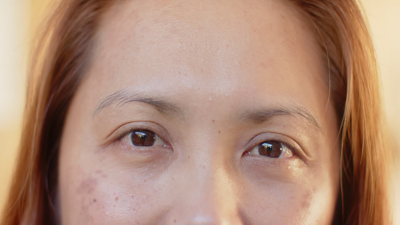 Close-up of mature woman eyes, showing natural beauty and aging gracefully