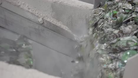 conveyor full of used plastic bottles falling down.