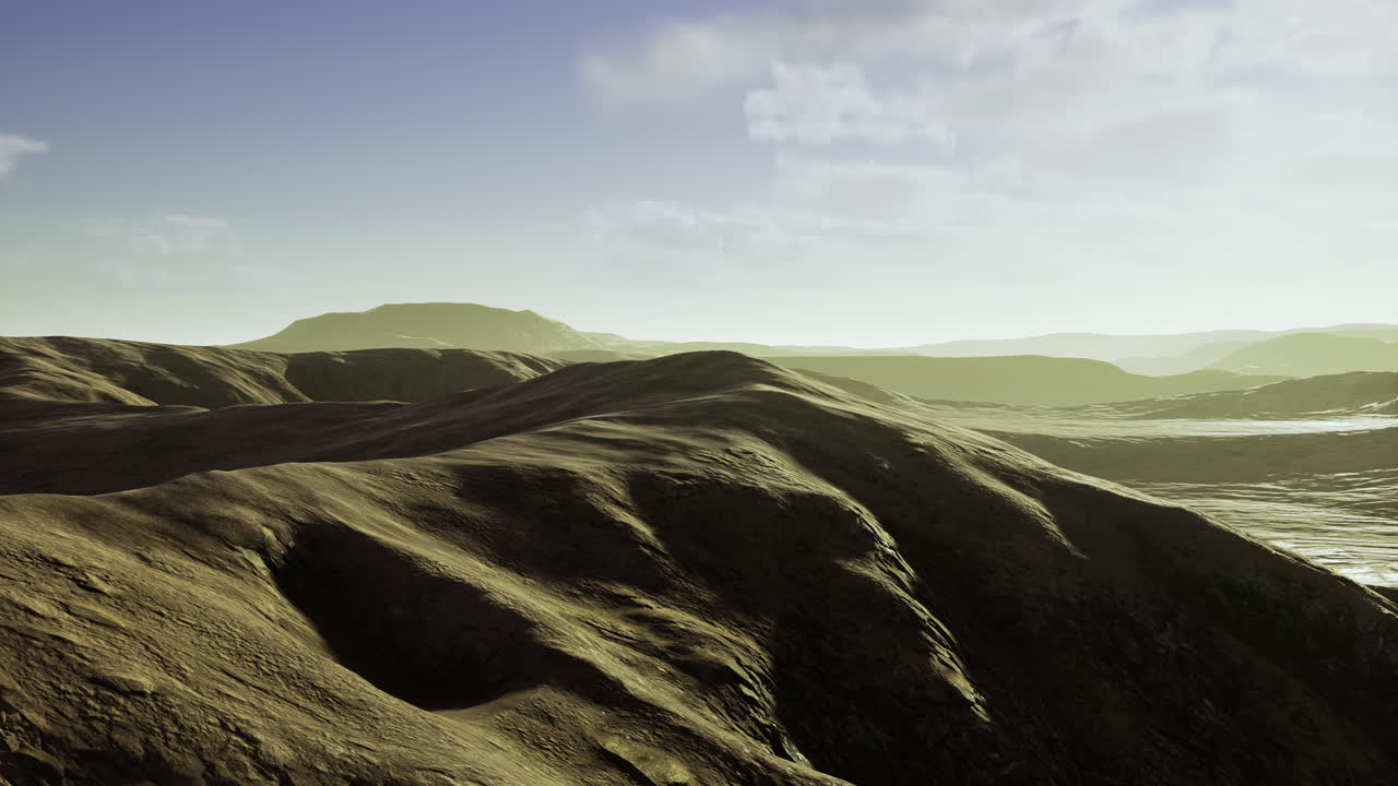 Breathtaking view of rolling hills under the soft glow of dawn