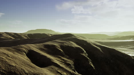 breathtaking view of rolling hills under the soft glow of dawn