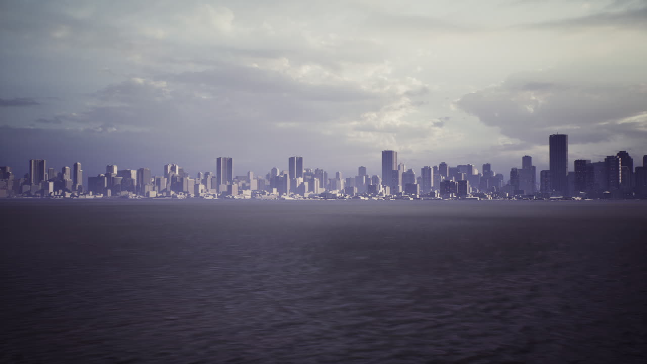 Skyline at dusk with dramatic clouds over the coastal waterfront