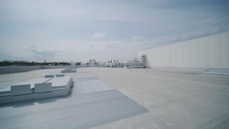 the air conditioning and ventilation system of a large industrial facility is located on the roof. it includes an air conditioner, smoke exhaust, and ventilation.