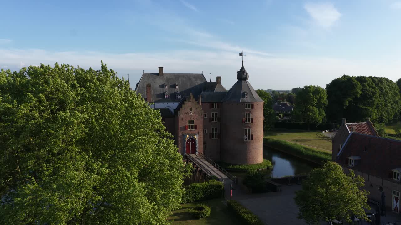 Ammersoyen Castle is a castle in Ammerzoden. Monument, histroic building, tower, walls, aerial video, building exterior.
