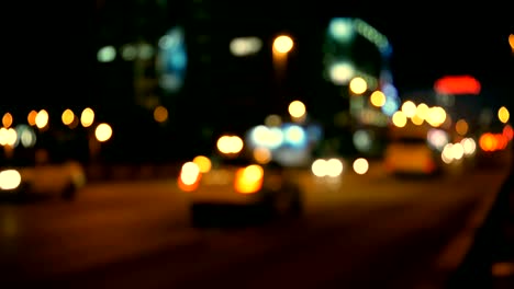 luces desenfocadas calle de los ángeles resumen. fondo borroso de la ciudad. círculos de bokeh en movimiento del tráfico nocturno.