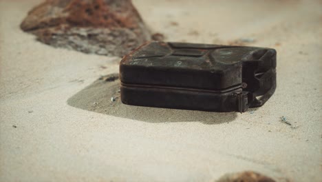 old rusty fuel canister in the desert