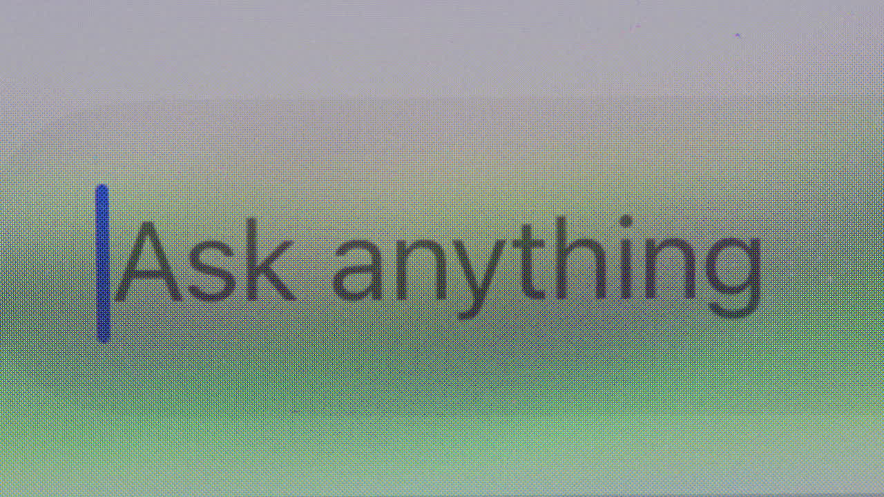 Close-up of Digital Screen Displaying 'Ask Anything' Text