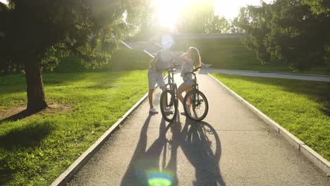 couple enjoying a bike ride in the park