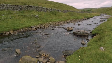 clean river water flowing yorkshire whernside countryside rural landscape, uk