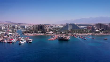 eilat shorline with marina boats hotels and landscape aerial