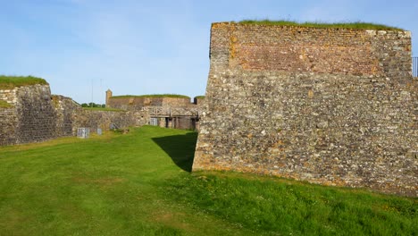 Panning-right-shot-of-Charles-Fort's-exterior-wall-in-Kinsale,-Ireland