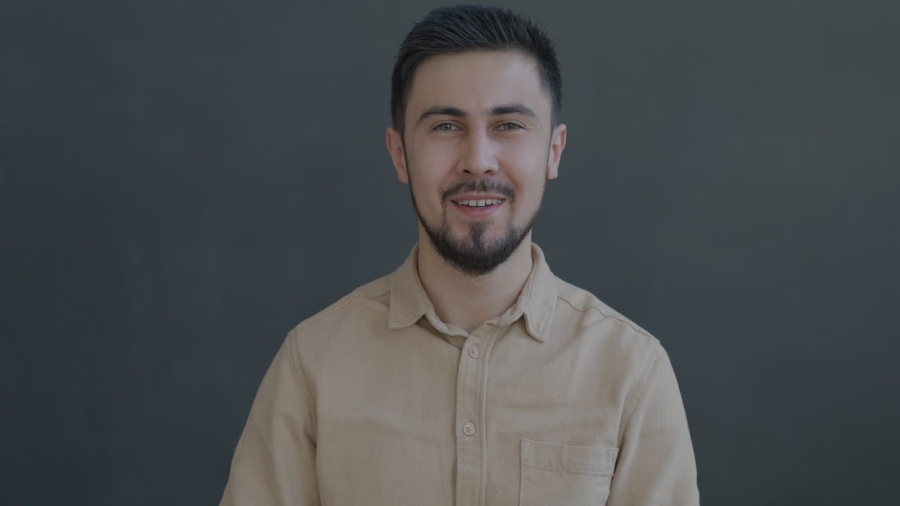 Smiling Man with an Ok Gesture