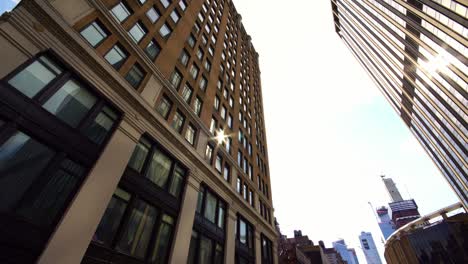 low angle view moving shot of nyc new york city manhattan skyscraper buildings