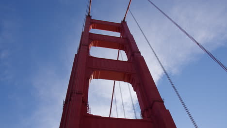 Iconic-Red-Tower-Of-Golden-Gate-Bridge-Against-Sunny-Blue-Sky