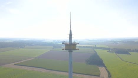 telecommunication tower plettenberg in dotternhausen, germany with foggy landscape in background