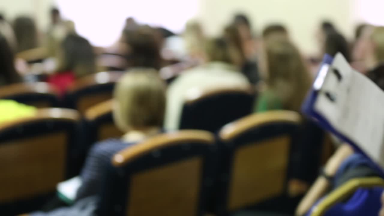 Executive Writing Notes. Close up of executive writing notes during business meeting