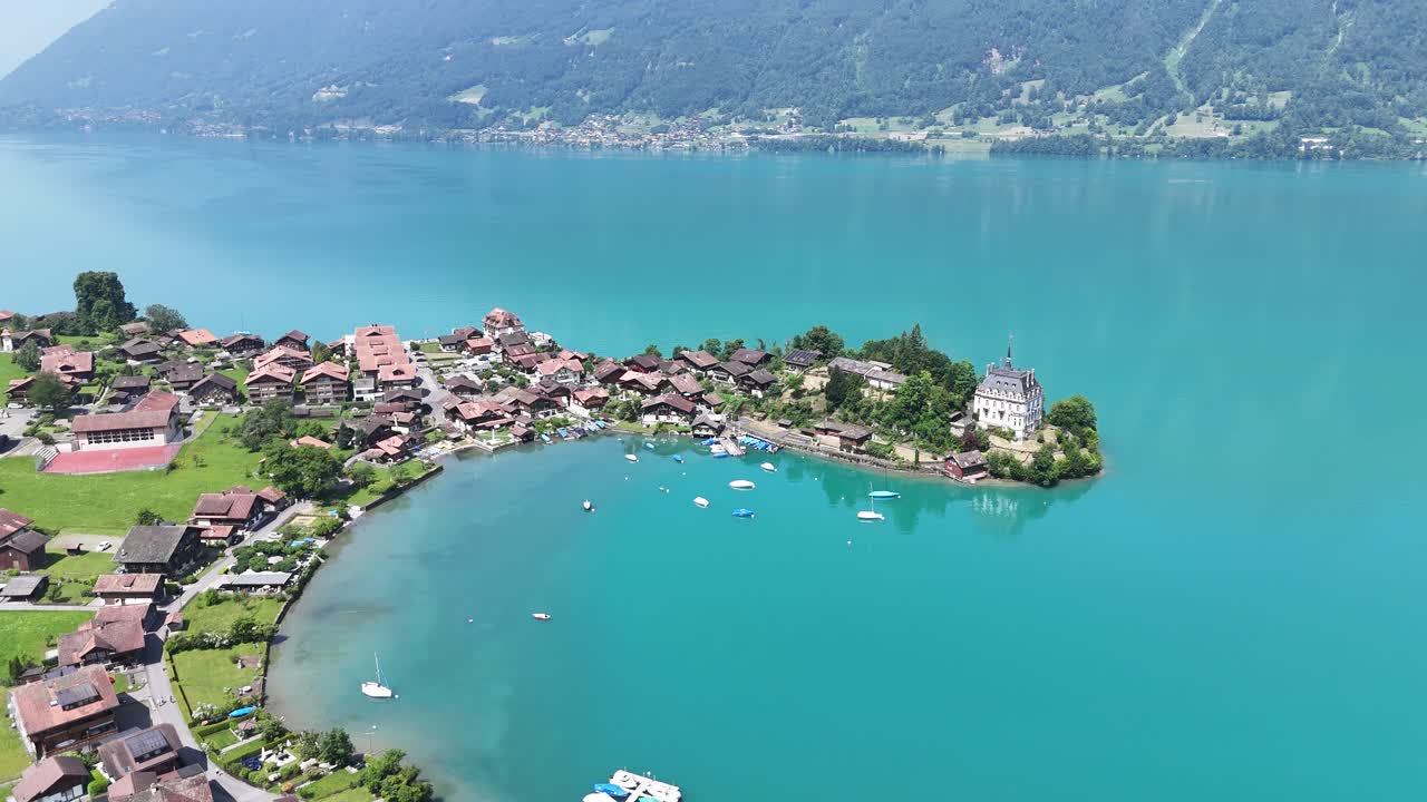 Establishing aerial shot Iselwalt village Switzerland Lake Brienz