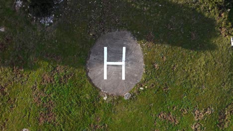 Aerial-top-View-of-Helipad-in-Verdant-Field