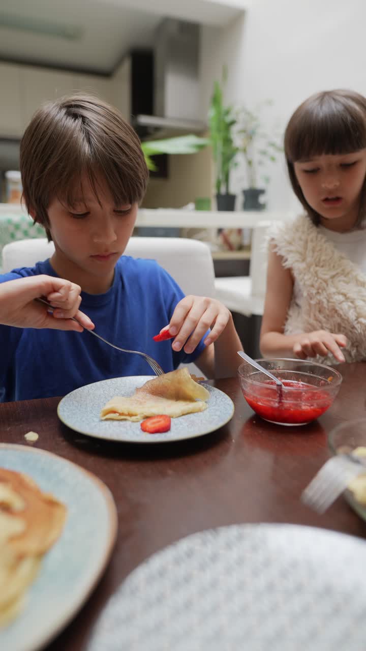 Children enjoying a pancake breakfast