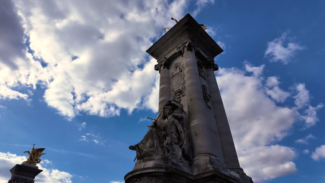 Impressive Statues and Architecture on a Parisian Bridge
