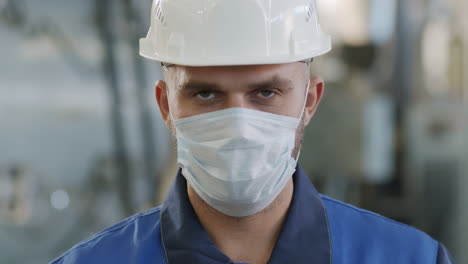 portrait of factory worker in face mask