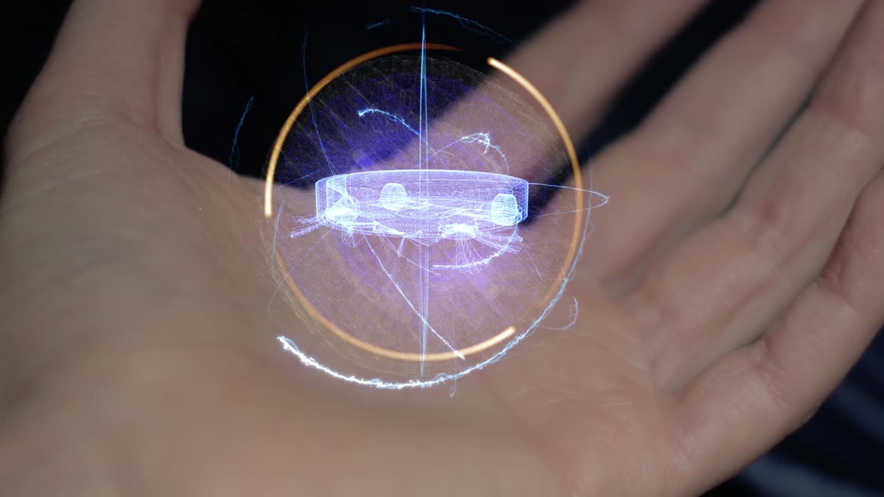 Robotic vacuum cleaner on a female hand