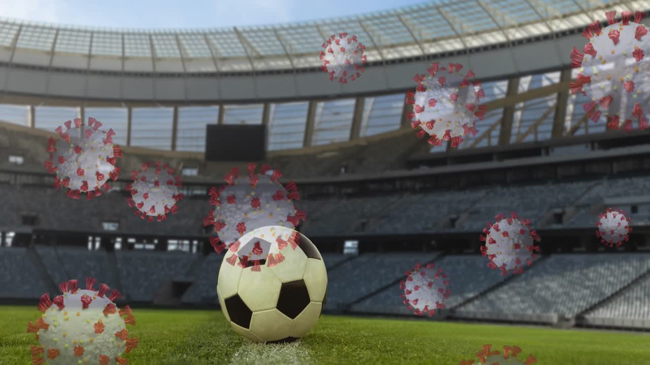 스포츠 경기장에서 축구공을 상대로 코로나19 세포