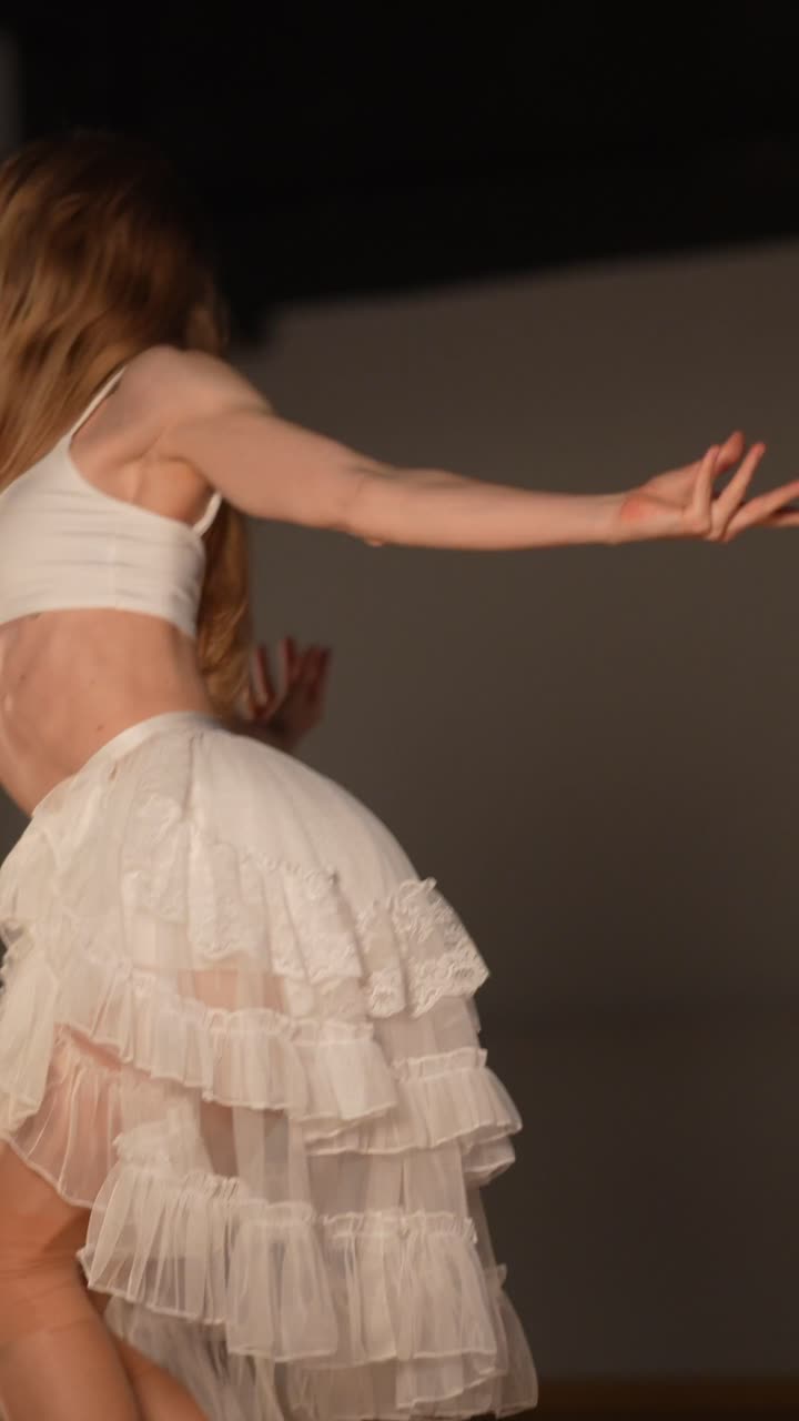 Performance of Contemporary Dance in a White Dress