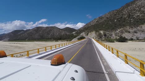 driving through mexico desert landscape in baja california sur road