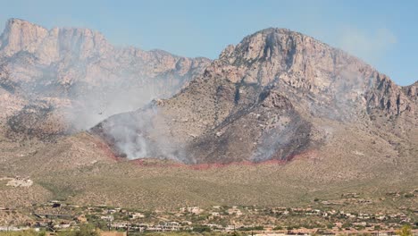 timelapse of wildfire smoke on hills of santa cataline mountains, arizona