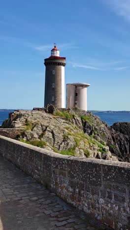vertical view of phare du petit minou aka petit minou lighthouse in daytime, plouzané, finistère, brittany, france