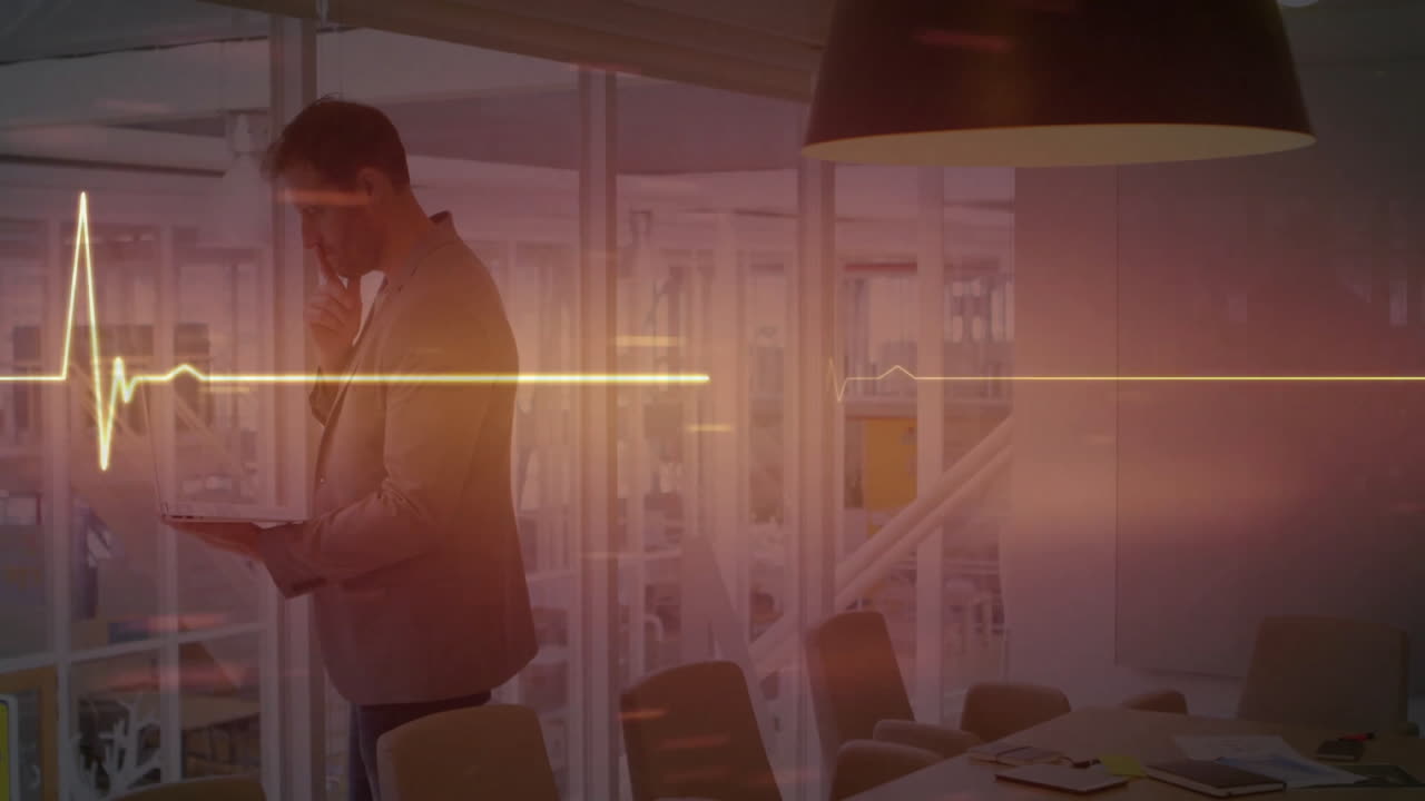 Animation of monitor data processing over caucasian businessman using tablet