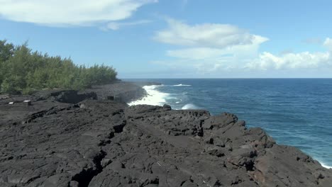 4K-aerial-pull-out-on-lava-cliff