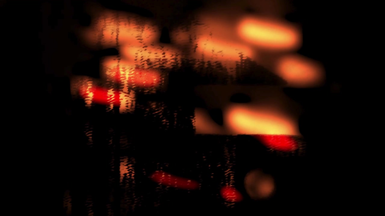 Abstract Light Streaks and Glowing Red Orbs in Darkness