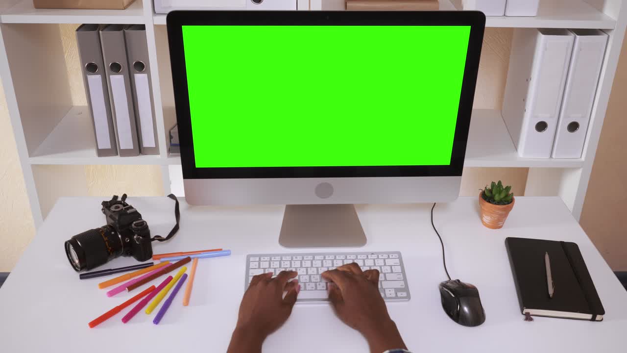 unrecognizable female works on pc