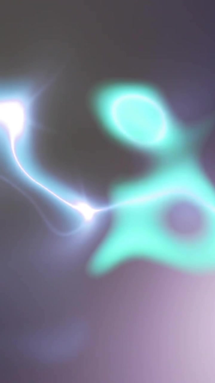 Animation of glowing light trails moving over black background