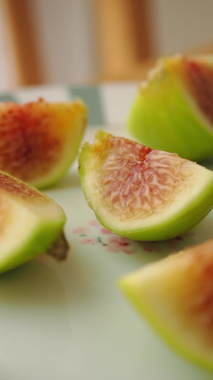 Fresh Sliced Green Figs on a Decorative Plate